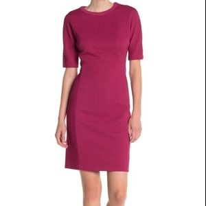 Ready for the holidays in this Maggy London Arc Shoulder Sheath Dress